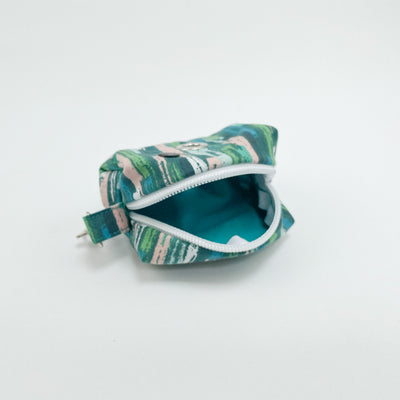 Autumn stripe dog poop bag holder, fully lined in a bright teal fabric.