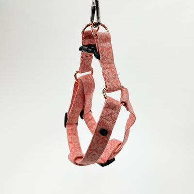 Liberty Peach Floral Step-in Dog Harness with a black plastic quick-release buckle and rose gold D-Rings.