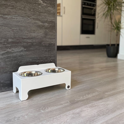 White,  Raised Dog Bowl Feeding Stand in size medium.