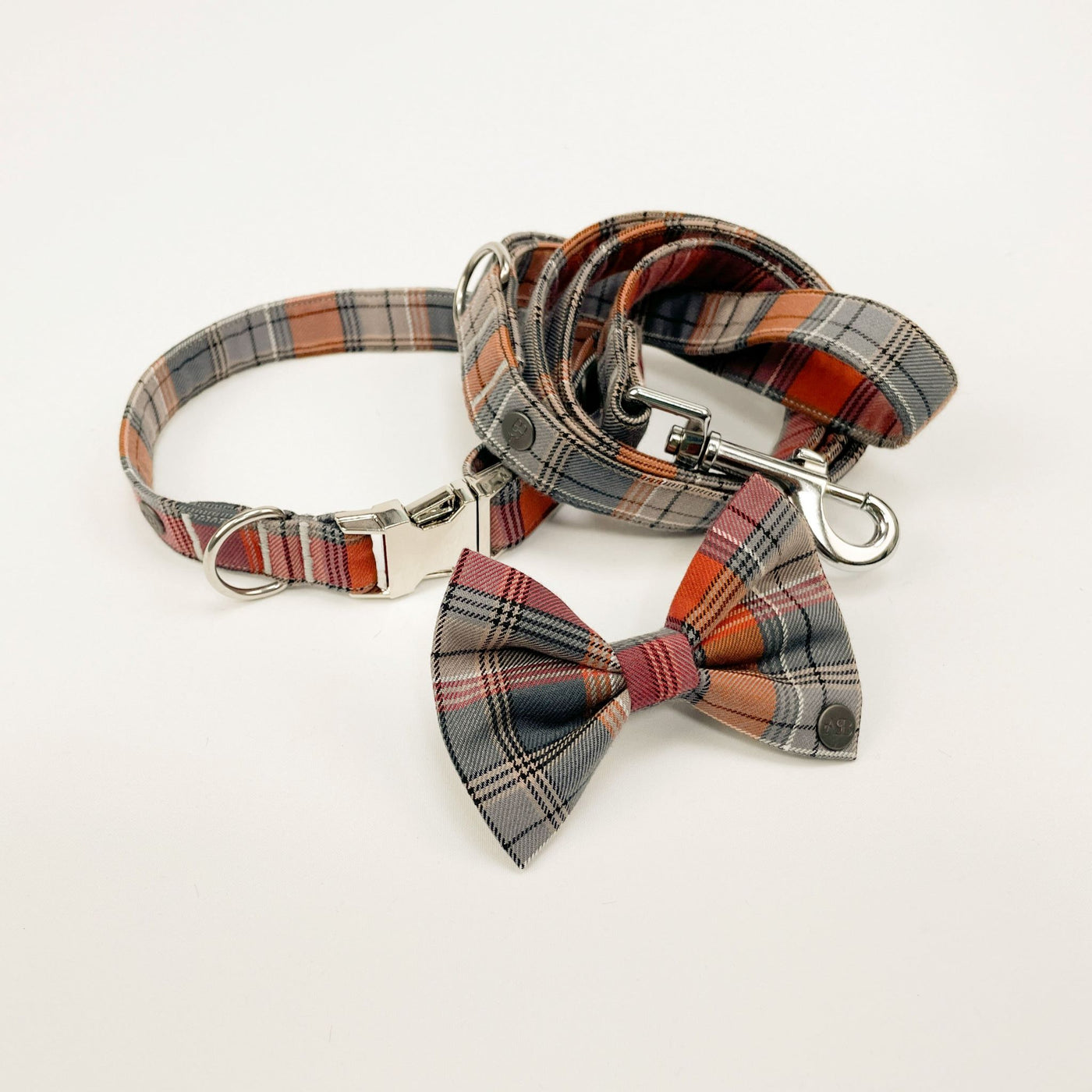 Dog lead, collar and bow tie. Part of the Grey and Orange Autumn Check Set.