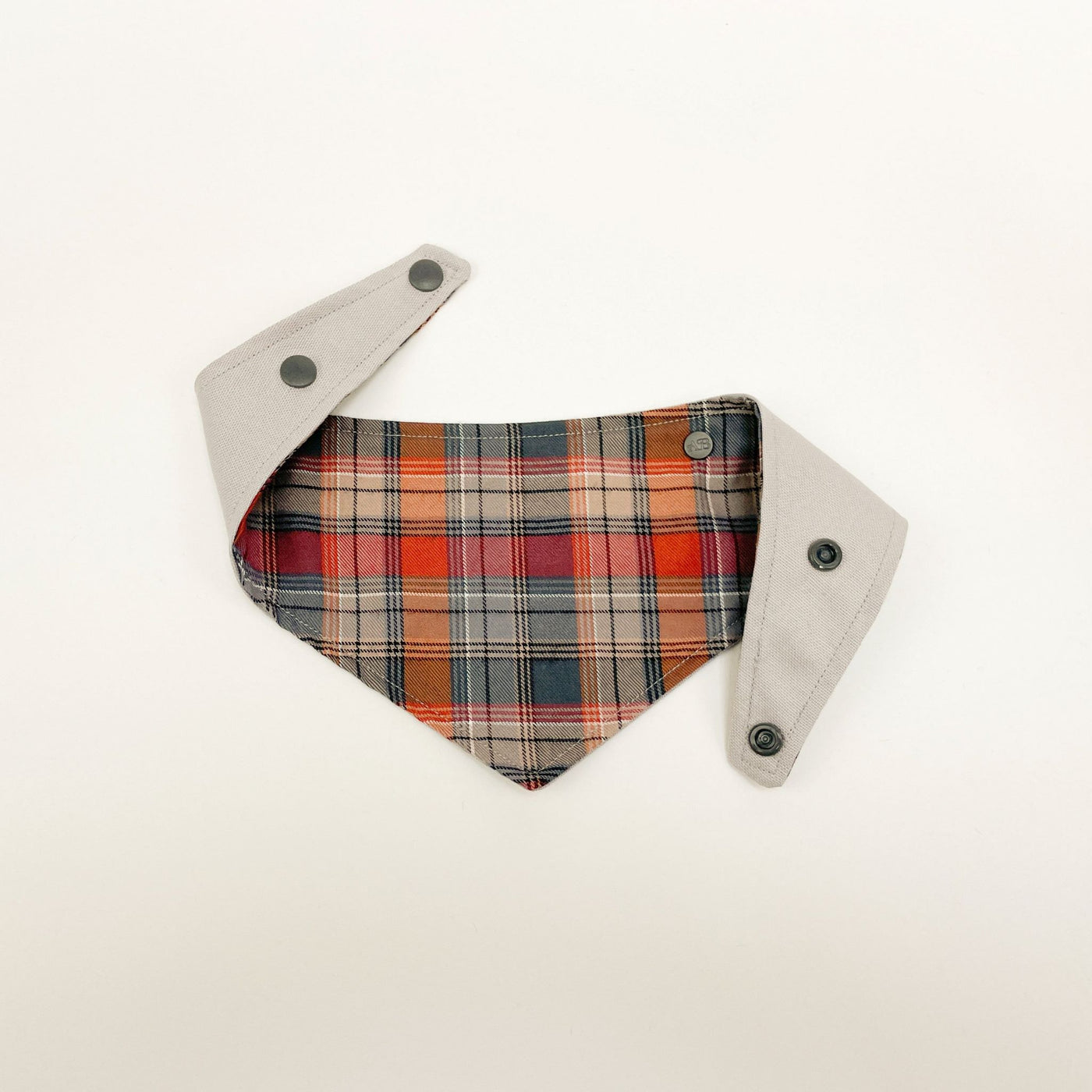 Grey and Orange Autumn Check Dog Bandana with popper fastening.