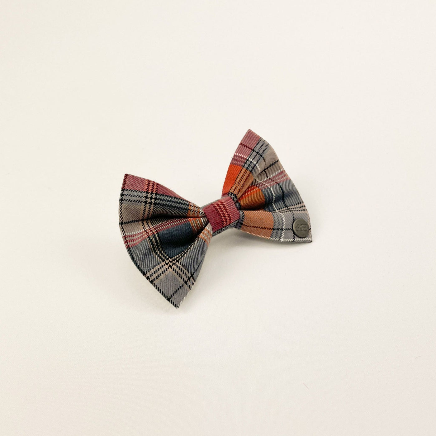 Grey and Orange Autumn Check Dog Bow Tie from the side.