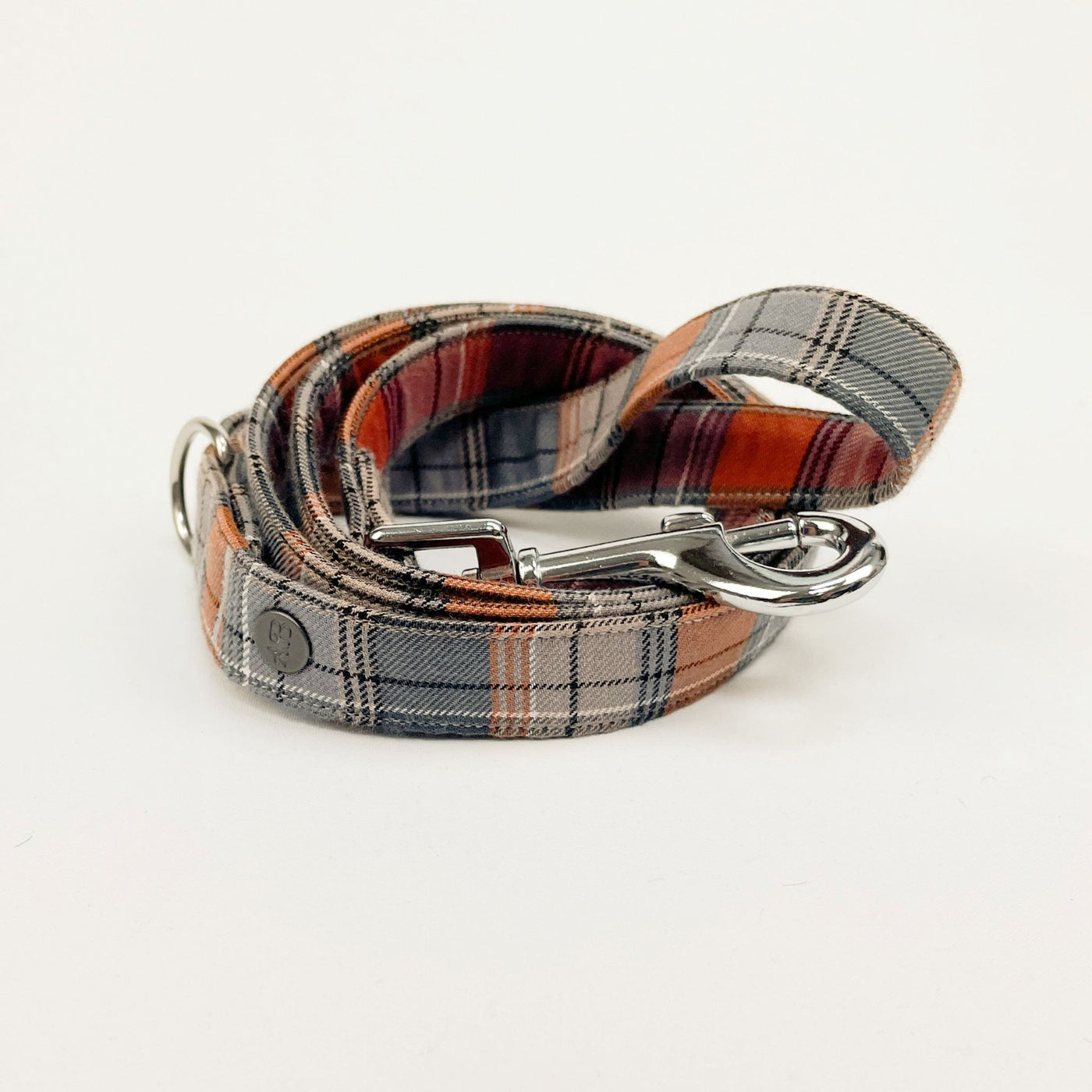 Grey and orange autumn check dog lead in soft-touch fabric.