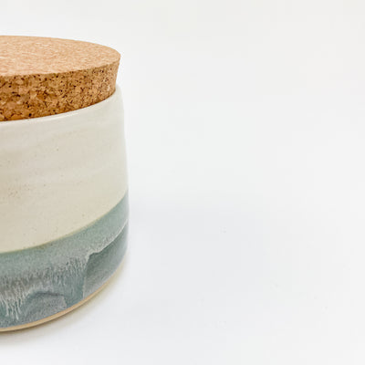 Ceramic treat jar with two-tone speckled grey glaze.