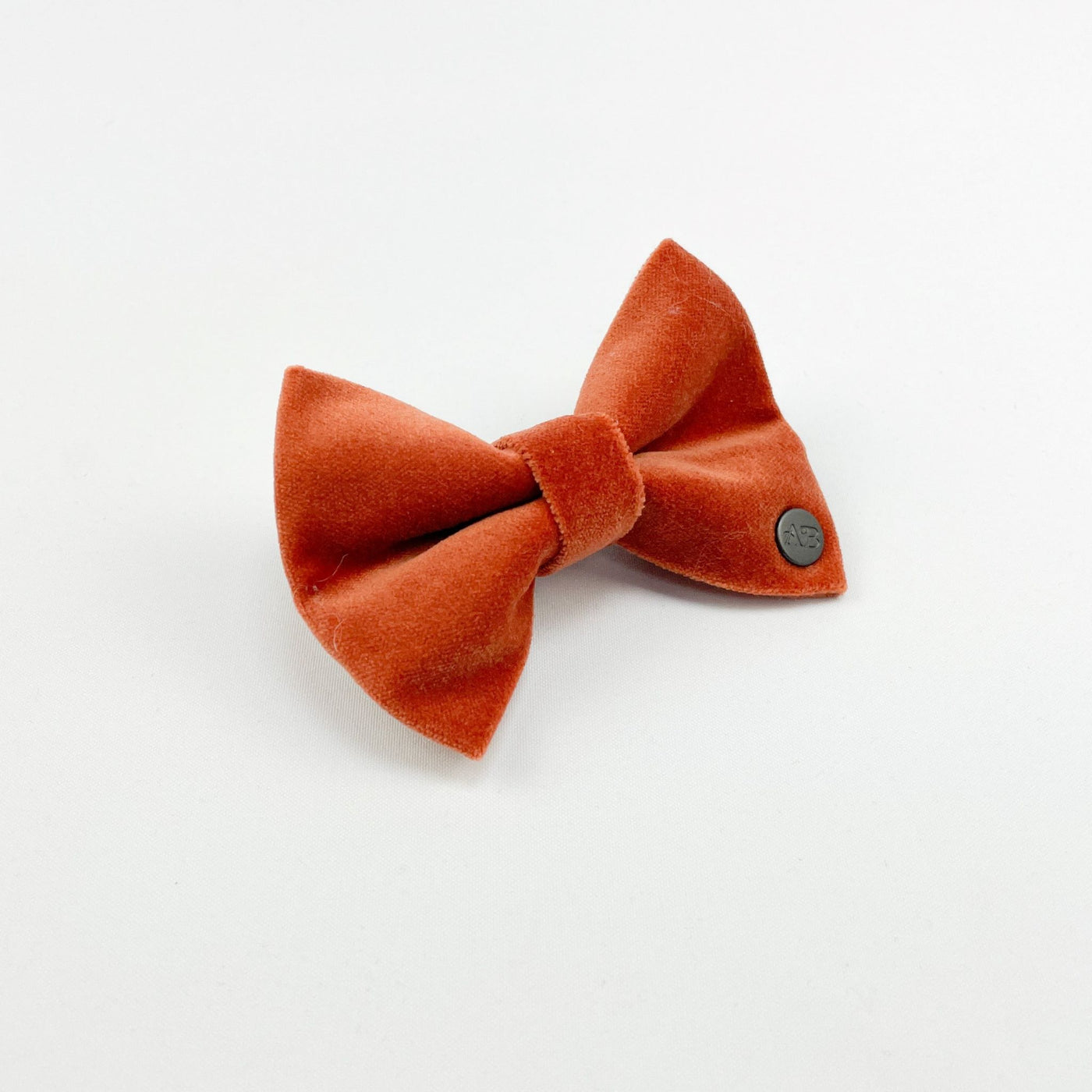 Luxury Orange Velvet Dog Bow Tie from the side.