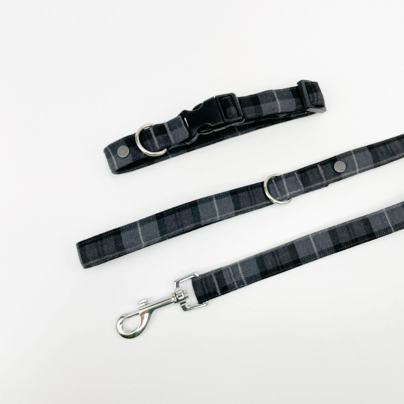 matching dog collar and lead in charcoal grey classic tartan print.