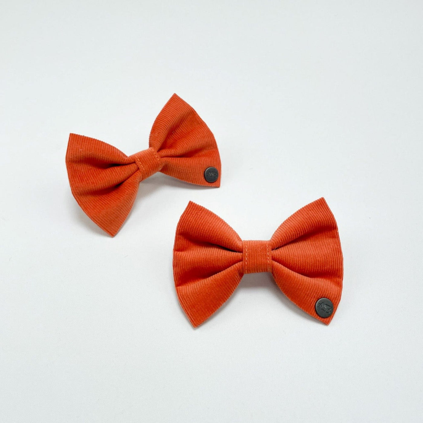 Orange Corduroy Dog Bow Tie, show n in two sizes (three available).