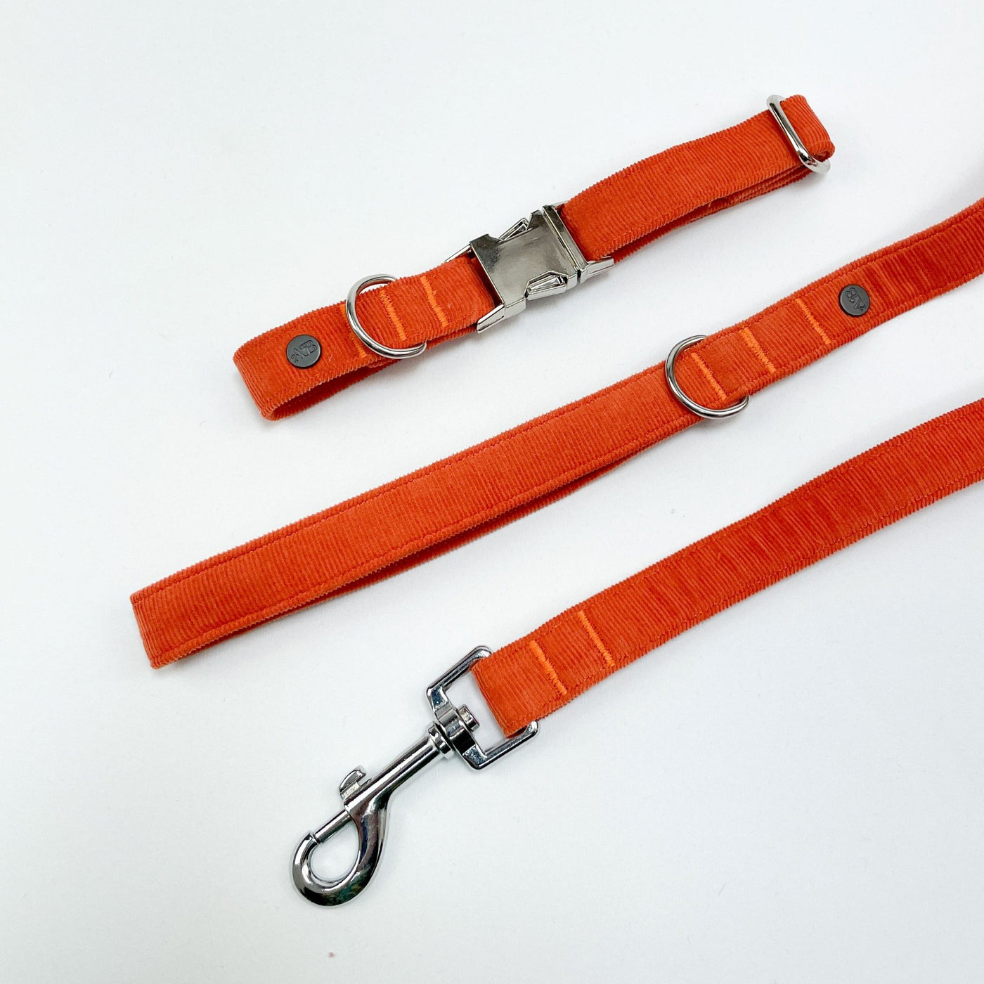 Orange Corduroy Dog Lead alongside matching collar, available separately.