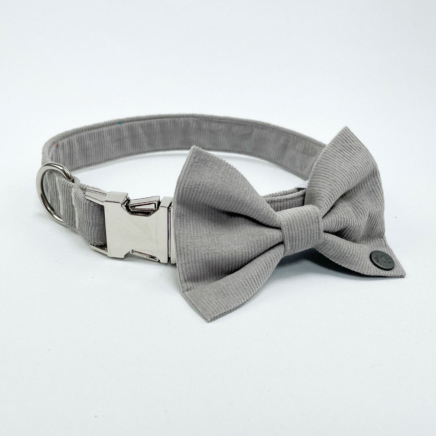 Silver Grey Corduroy Dog Bow Tie on matching collar from side aspect.