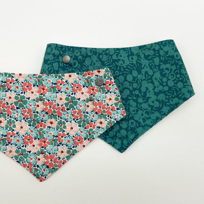 Reversible dog bandana in Liberty Winter Floral fabric with an emerald winter berry floral reverse fabric.