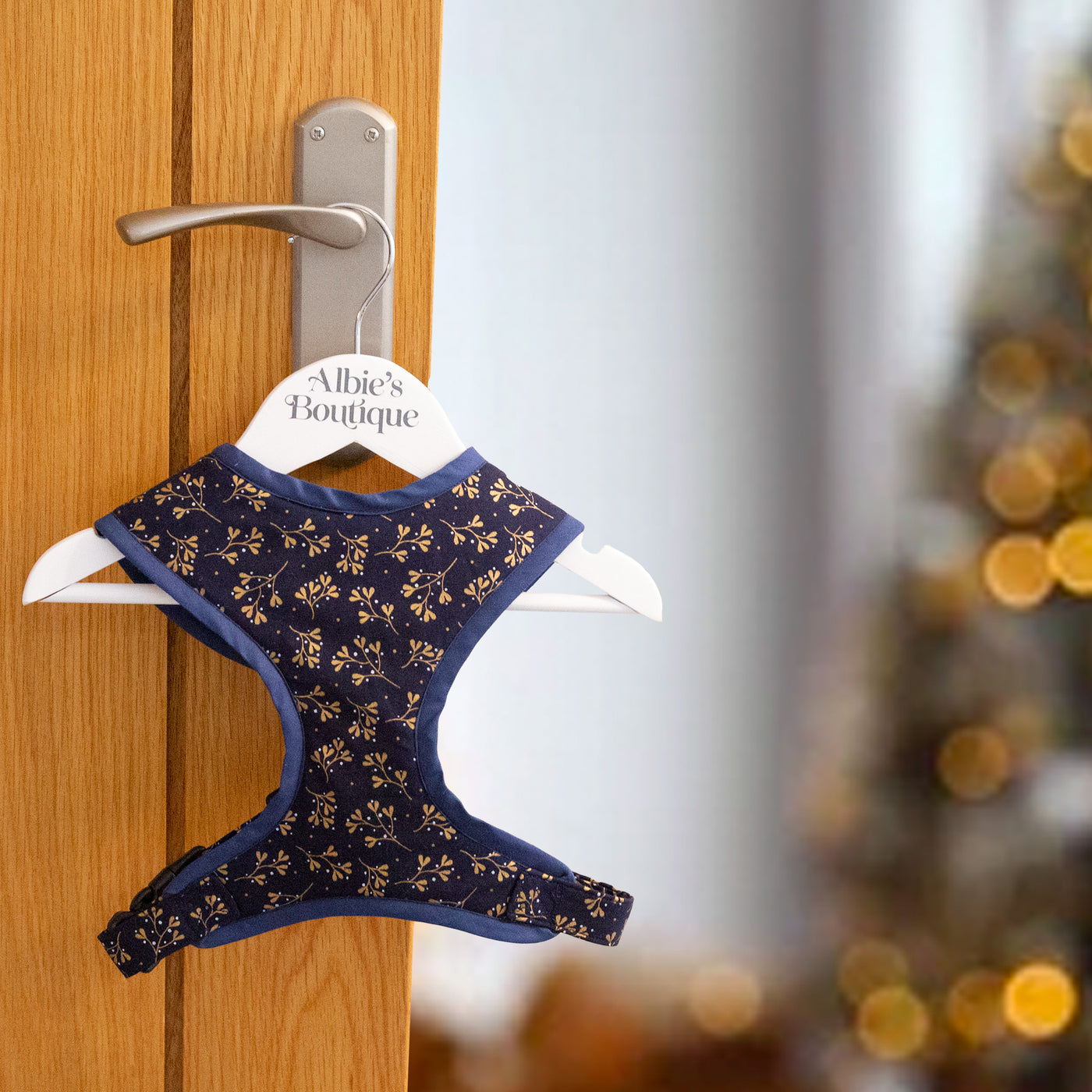 Navy Mistletoe soft dog harness in a Christmas setting