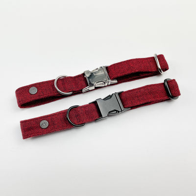 Two Cranberry herringbone dog collars, one with silver and the other with black fittings
