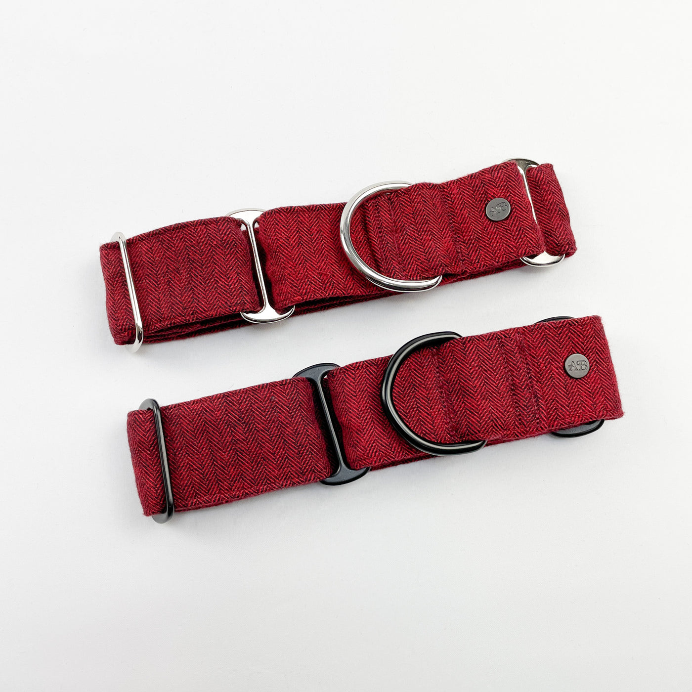 Cranberry herringbone martingale collar, one with silver and one with black fittings