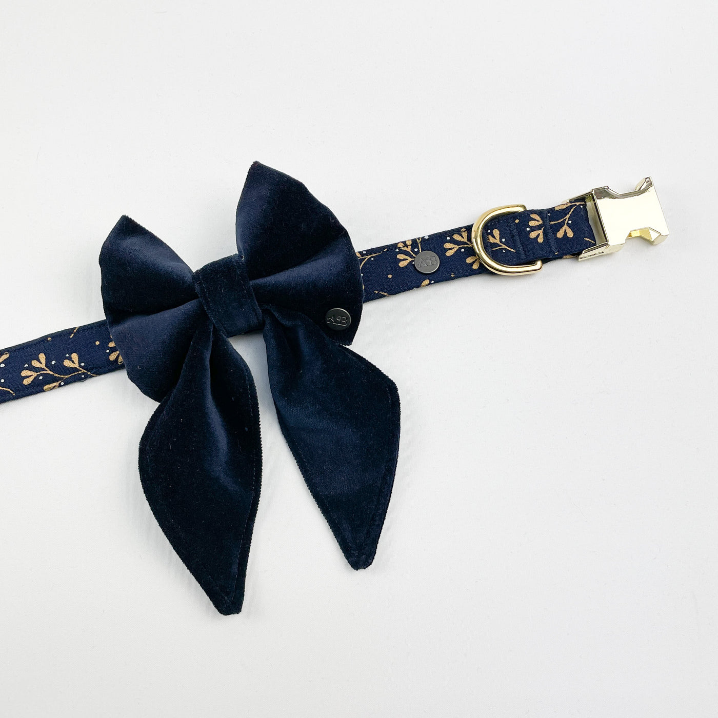 Navy velvet sailor bow on navy mistletoe fabric dog collar