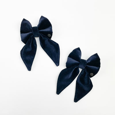 two navy velvet dog bow ties