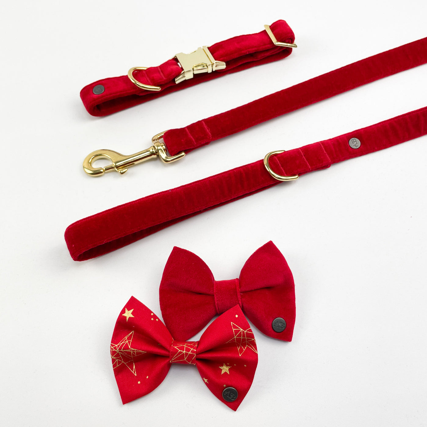 Red velvet dog collar and lead set with a red velvet bow and red star sparkle bow