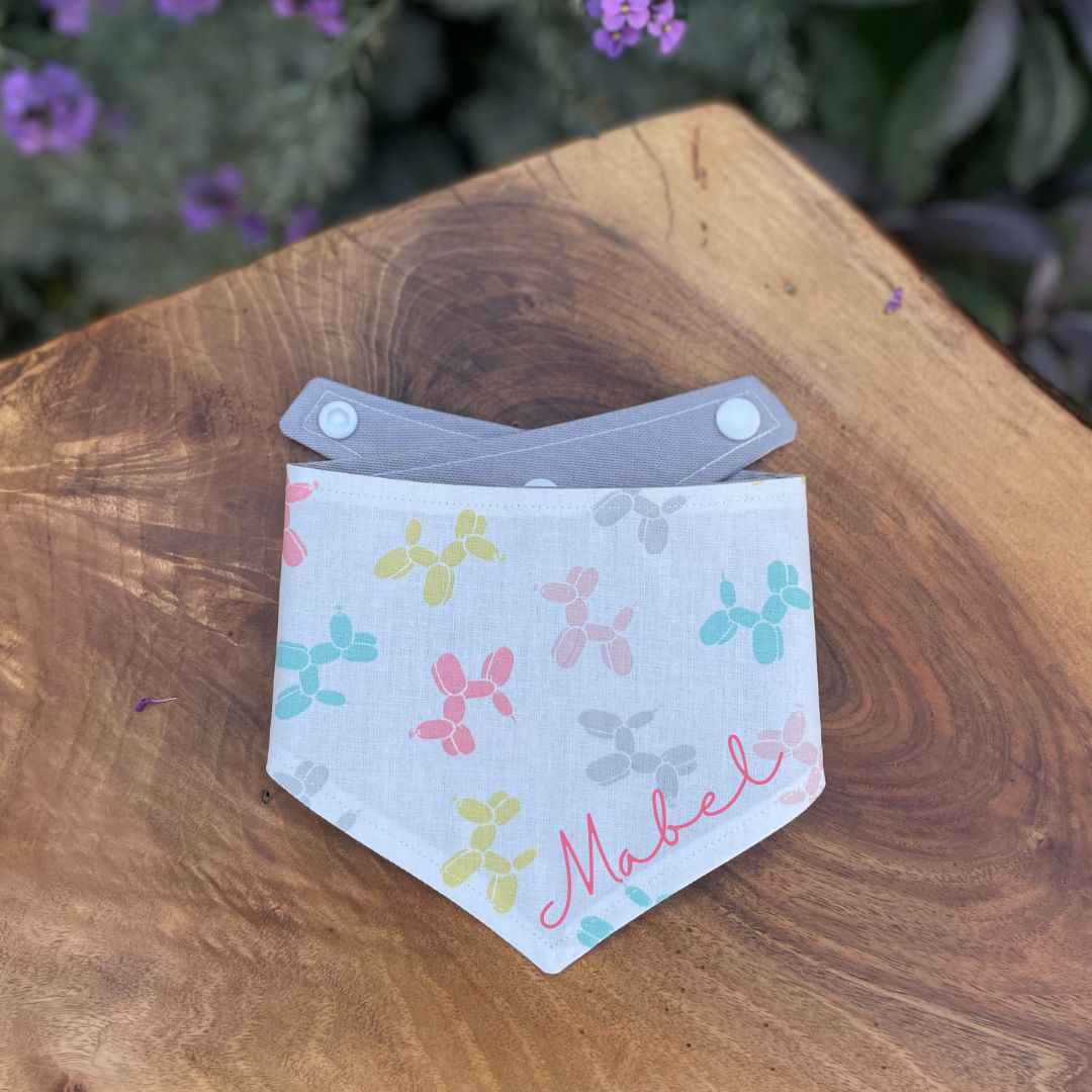 Birthday Girl Dog Bandana in soft pink personalised with the name Mabel.