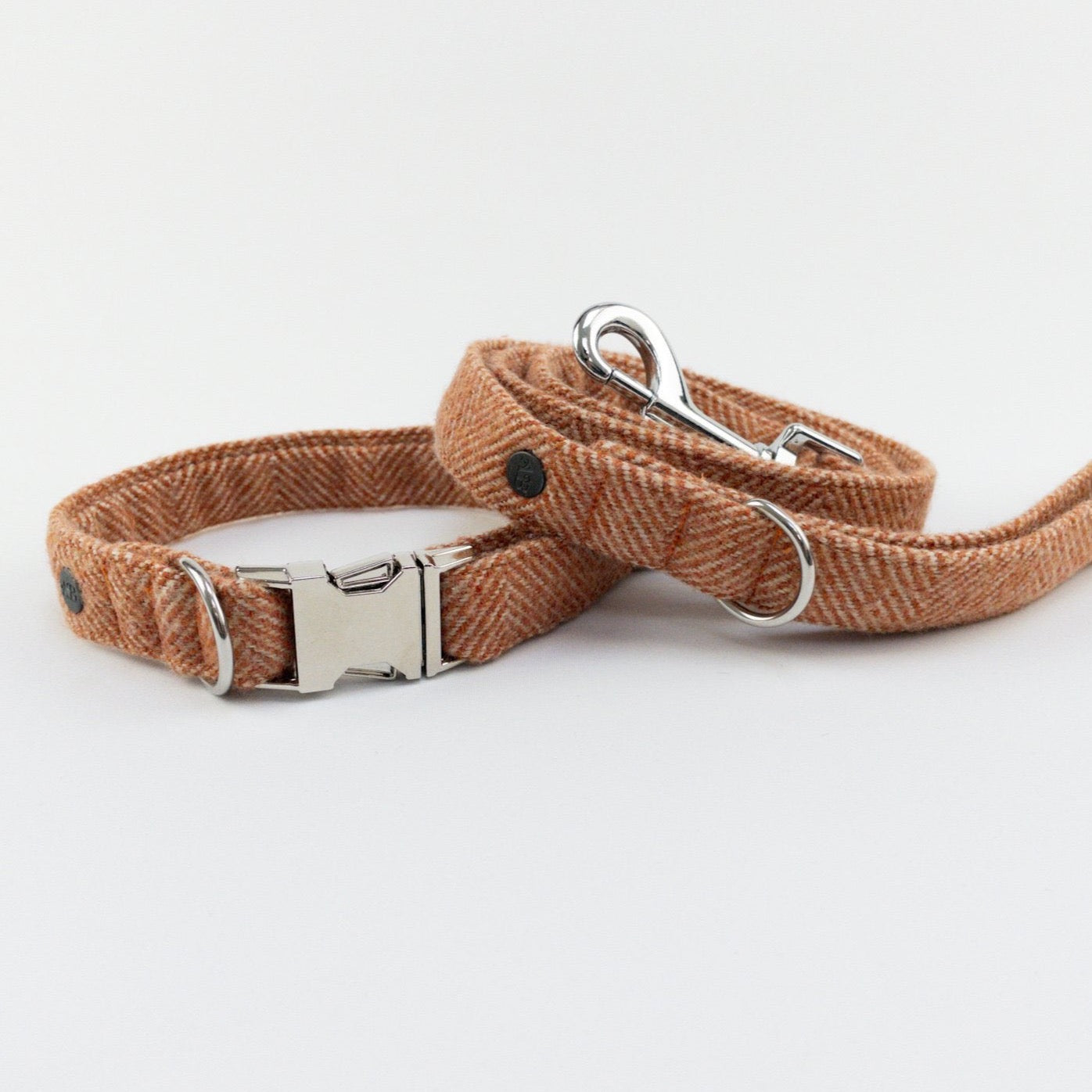 Burnt umber herringbone dog collar and lead.