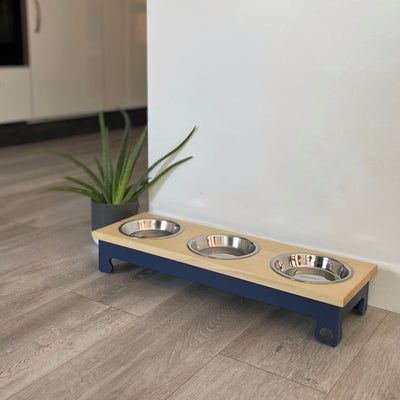 Three-bowl raised feeder for cats and puppies in navy.