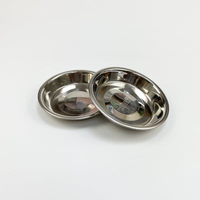 Two stainless steel bowls to fit raised pet feeders.