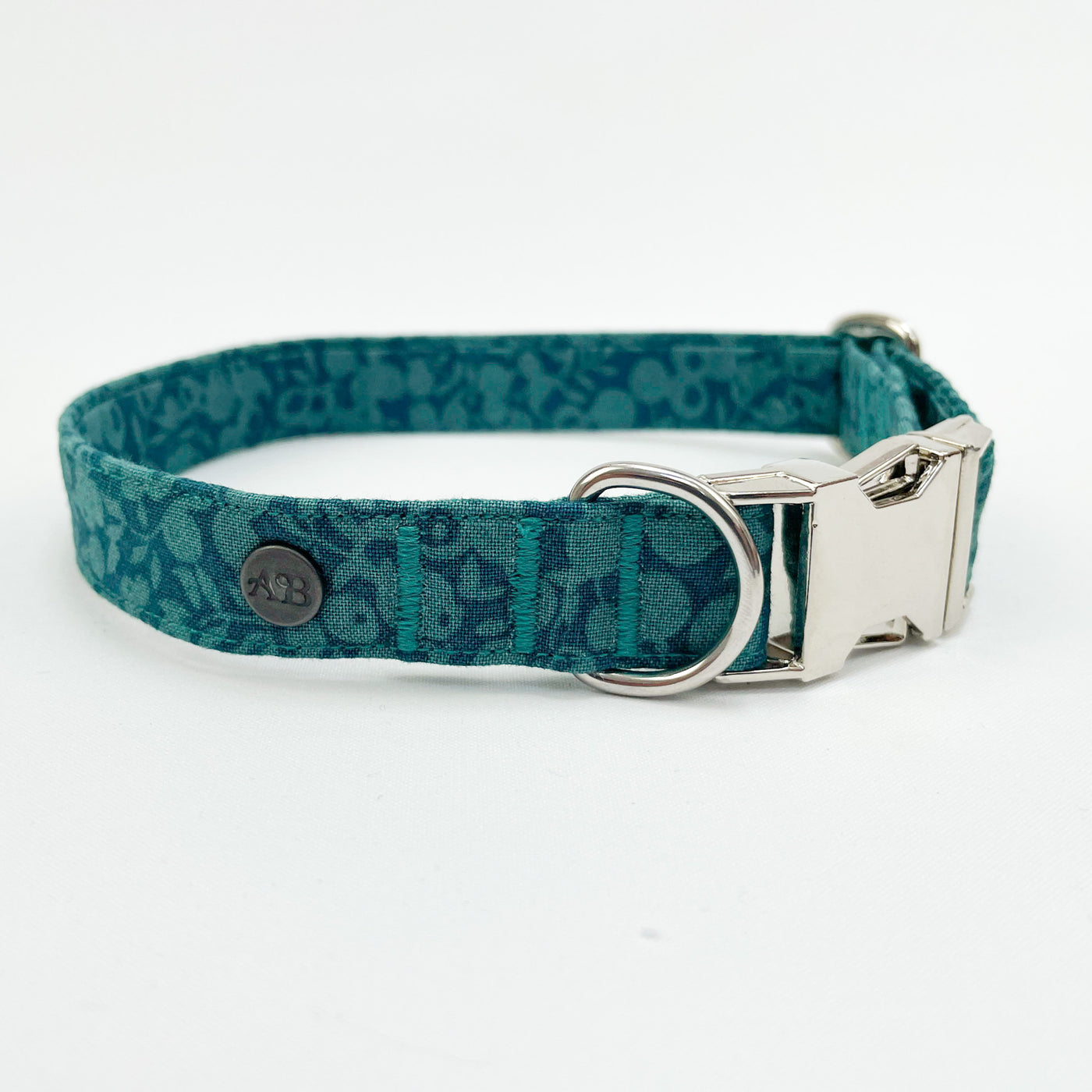 Liberty autumn emerald dog collar with a silver hardware and Albie's quality seal.