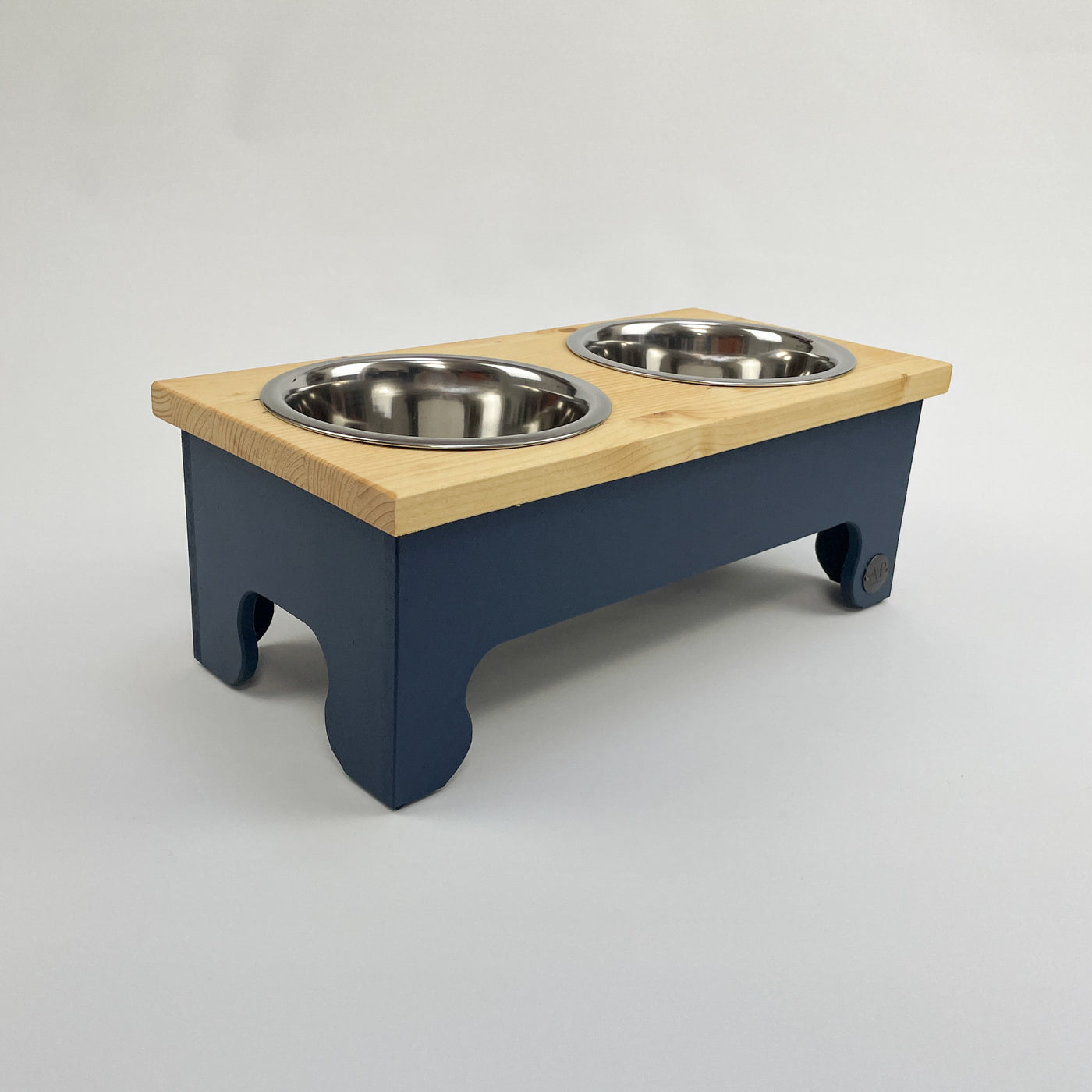 A navy raised pet feeding station in size medium.