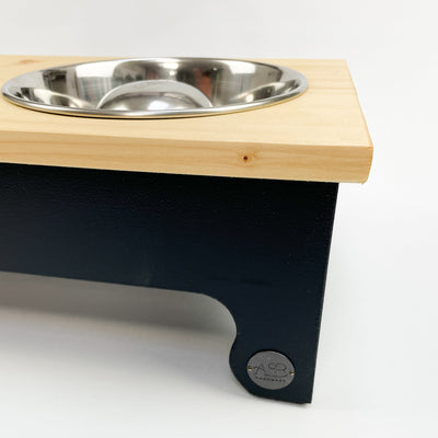 Pine top raised bowl pet feeding station in charcoal black.