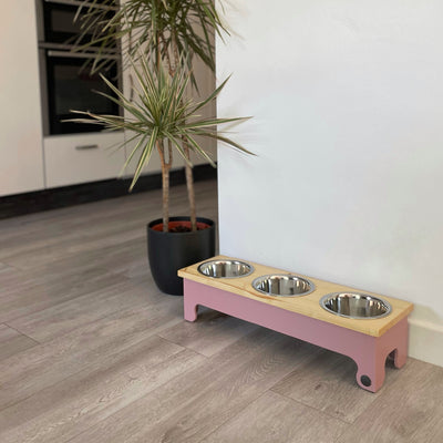 Three bowl, pine top raised feeding stand in size medium, colour blush pink.
