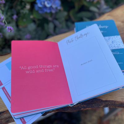 "All good things are wild and free," quote inside  the dog adventure journal
