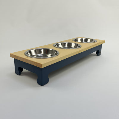 Cat and puppy pine top feeder, raised, colour navy.