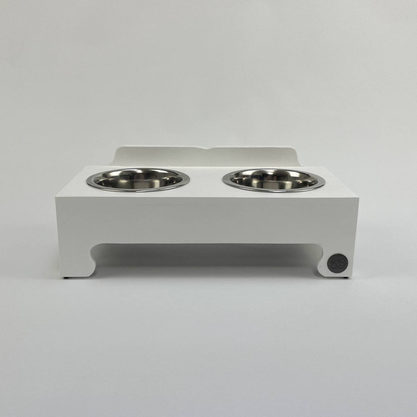Double-bowl Raised Dog Feeding Stand in size small, white